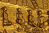 Luang Prabang, Laos - Wat Mai the gilded stucco engravings of the veranda. They narrate the Vessantara Jataka with scenes of everyday life. 